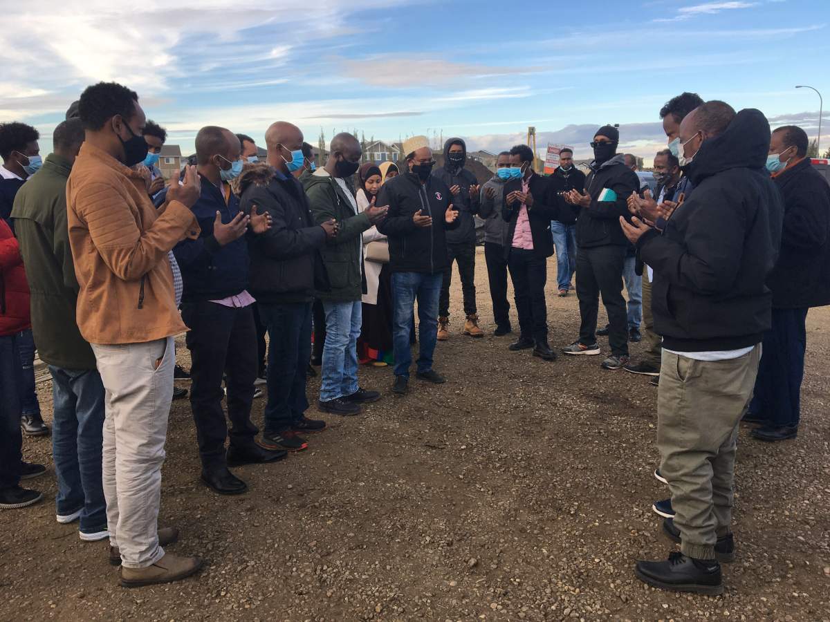 Friends and family gathered to mourn Samatar Sahal, who was killed while working at a Trans Mountain pipeline site in west Edmonton on Tuesday, Oct. 27, 2020.