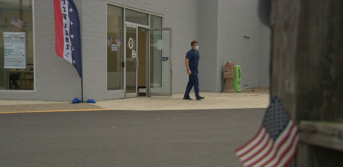 Voter exits polling station at Mountaineer Mall in Morgantown, W.Va.