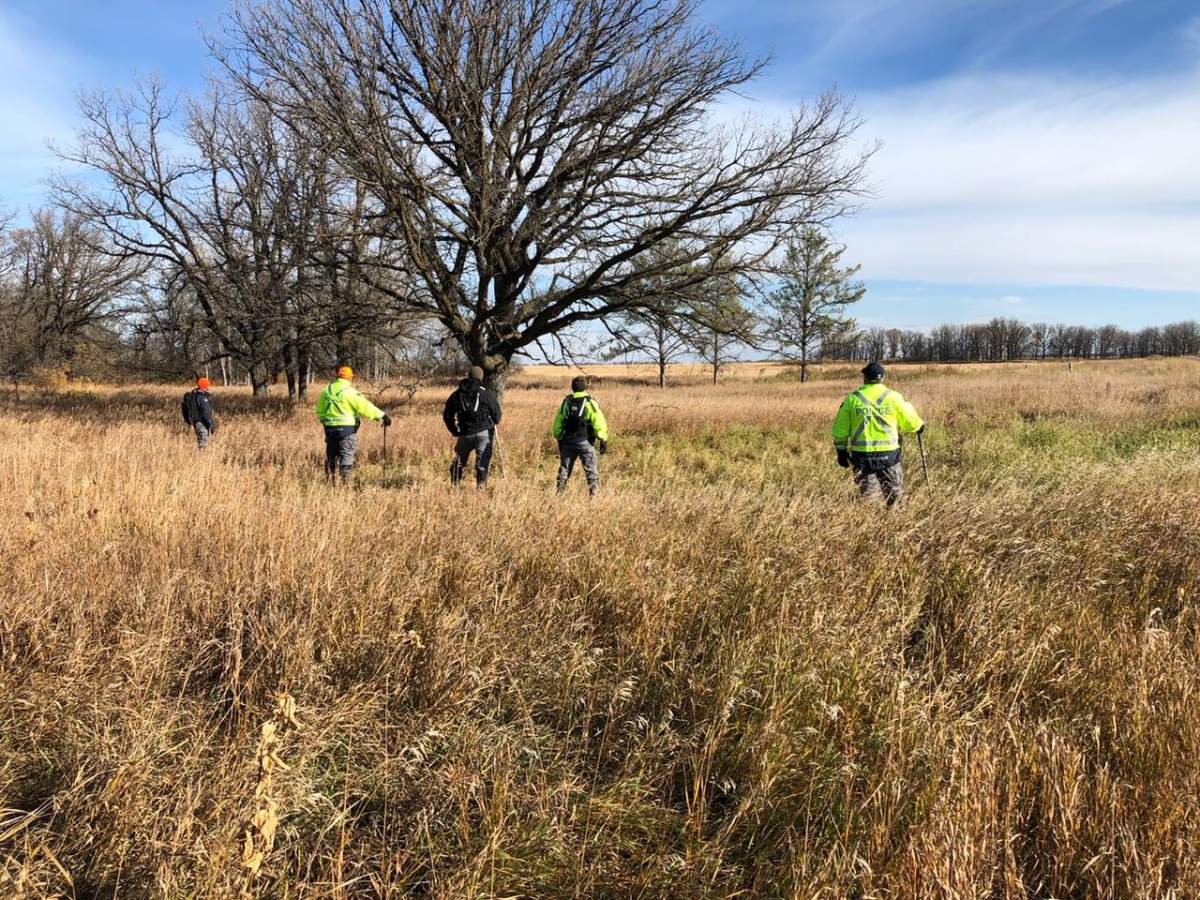 Manitoba RCMP search the Roseau River area Tuesday.
