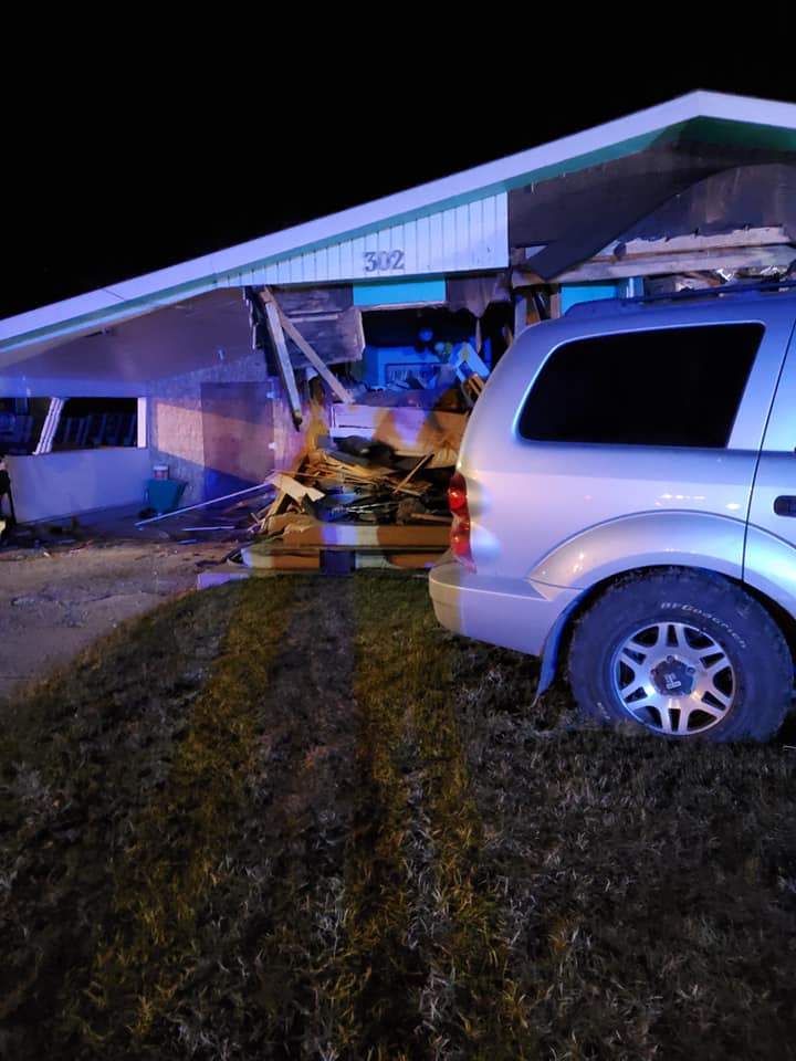 Another view of the scene shows the home extensively damaged. Witnesses say the home will likely be demolished.