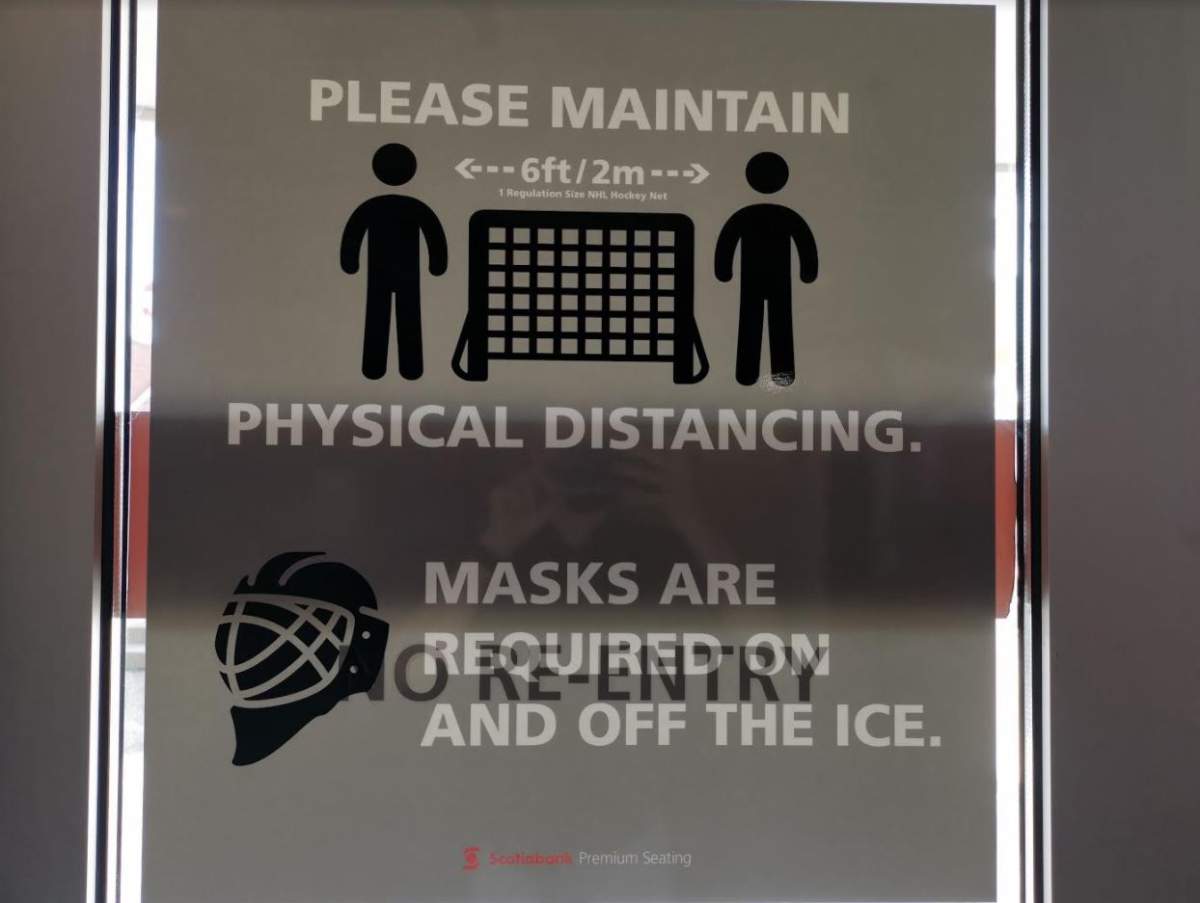Social distancing signs like these can be seen throughout the Scotiabank Centre.