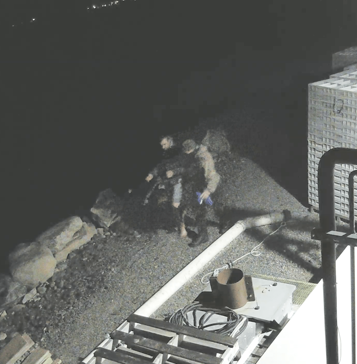 RCMP have released photos and a video they say show persons of interest in the fire that consumed a lobster pound in Middle West Pubnico, N.B., on Oct. 17, 2020.