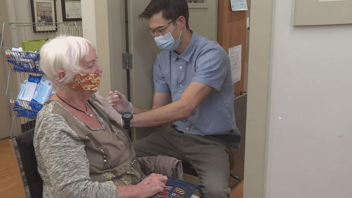 A client gets a flu shot at a Vernon pharmacy. Pharmacists are preparing to met an expected increase in demand. 