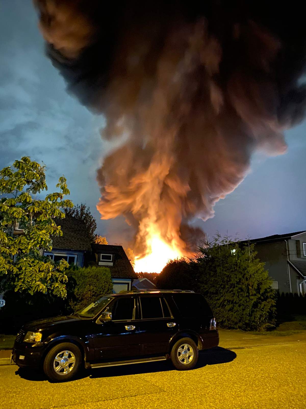 A huge fire burning in an industrial area of New Westminster’s Queensborough neighbourhood Monday evening.