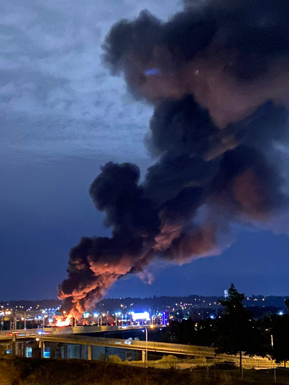 A huge fire burning in an industrial area of New Westminster’s Queensborough neighbourhood Monday evening.