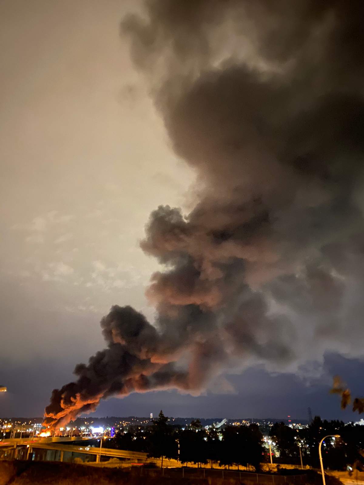 A huge fire burning in an industrial area of New Westminster’s Queensborough neighbourhood Monday evening.
