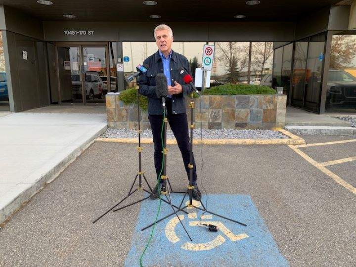 AUPE president Guy Smith speaks in Edmonton about AHS job cuts Tuesday, Oct. 13, 2020.