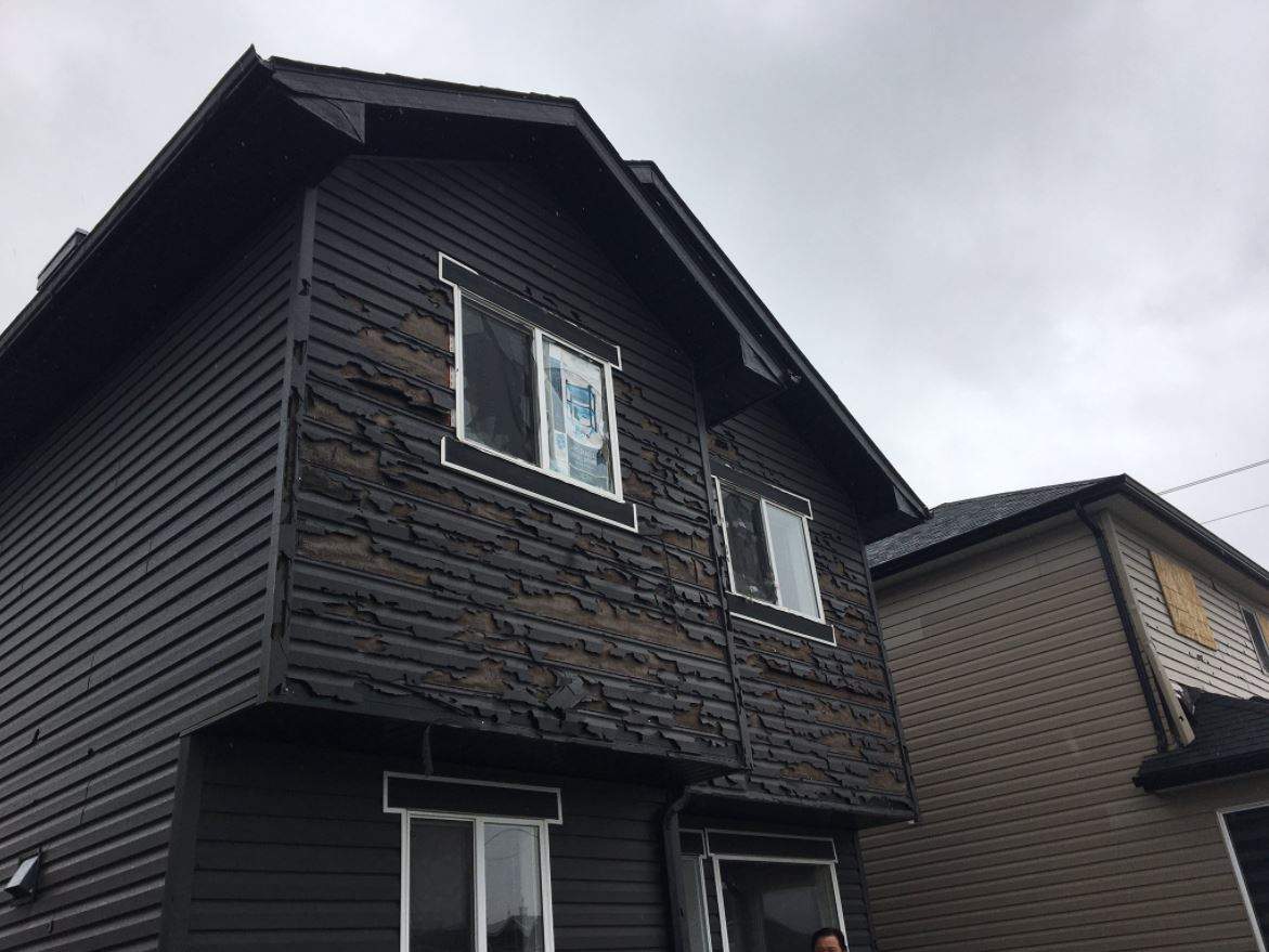 The west facing side of Louie Adriano’s home in northeast Calgary.