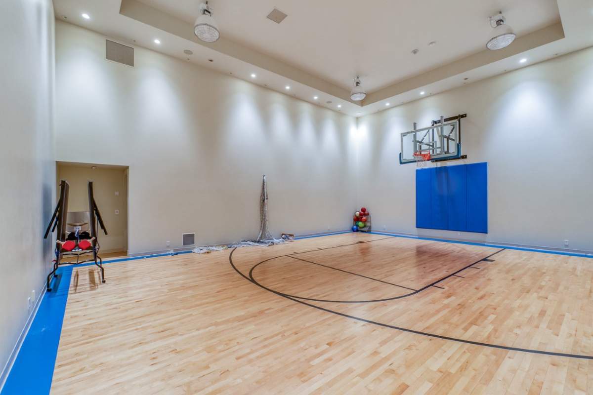 The mansion’s half-size basketball court.
