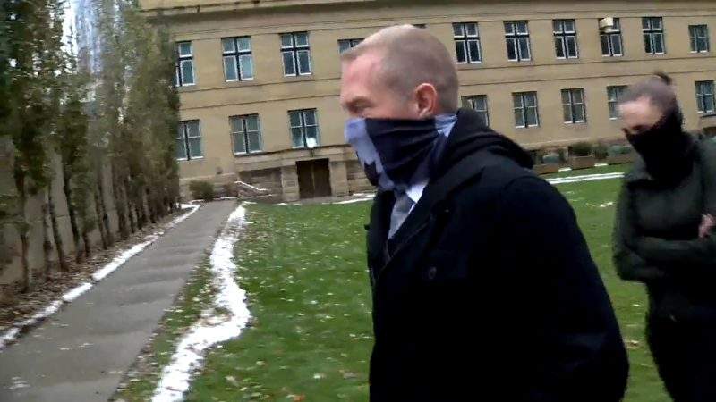 Const. Alex Dunn enters the Calgary Courts Centre on Oct. 28, 2020. 