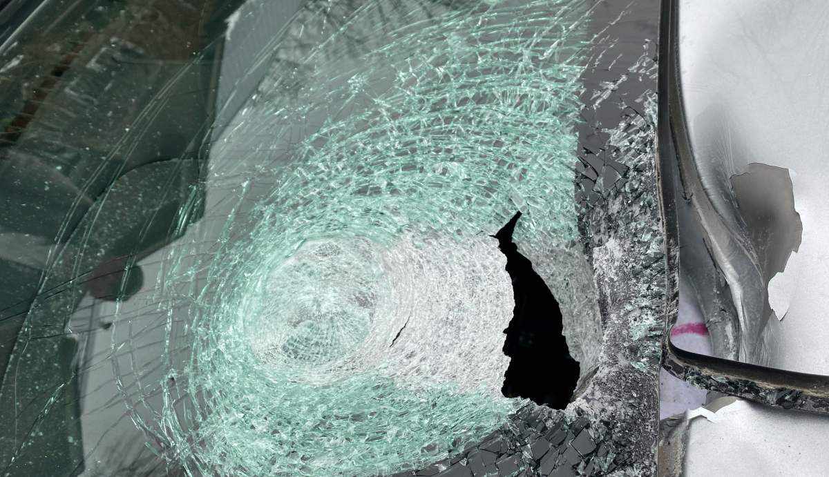 Peterborough County OPP are investigating after a moving vehicle was struck by a bowling ball in Selwyn Township.