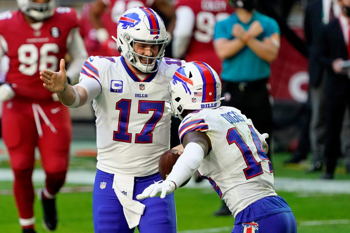 Buffalo Bills quarterback Josh Allen (17) celebrates his touchdown with wide receiver Stefon Diggs (14) during the first half of an NFL football game against the Arizona Cardinals, Sunday, Nov. 15, 2020, in Glendale, Ariz.