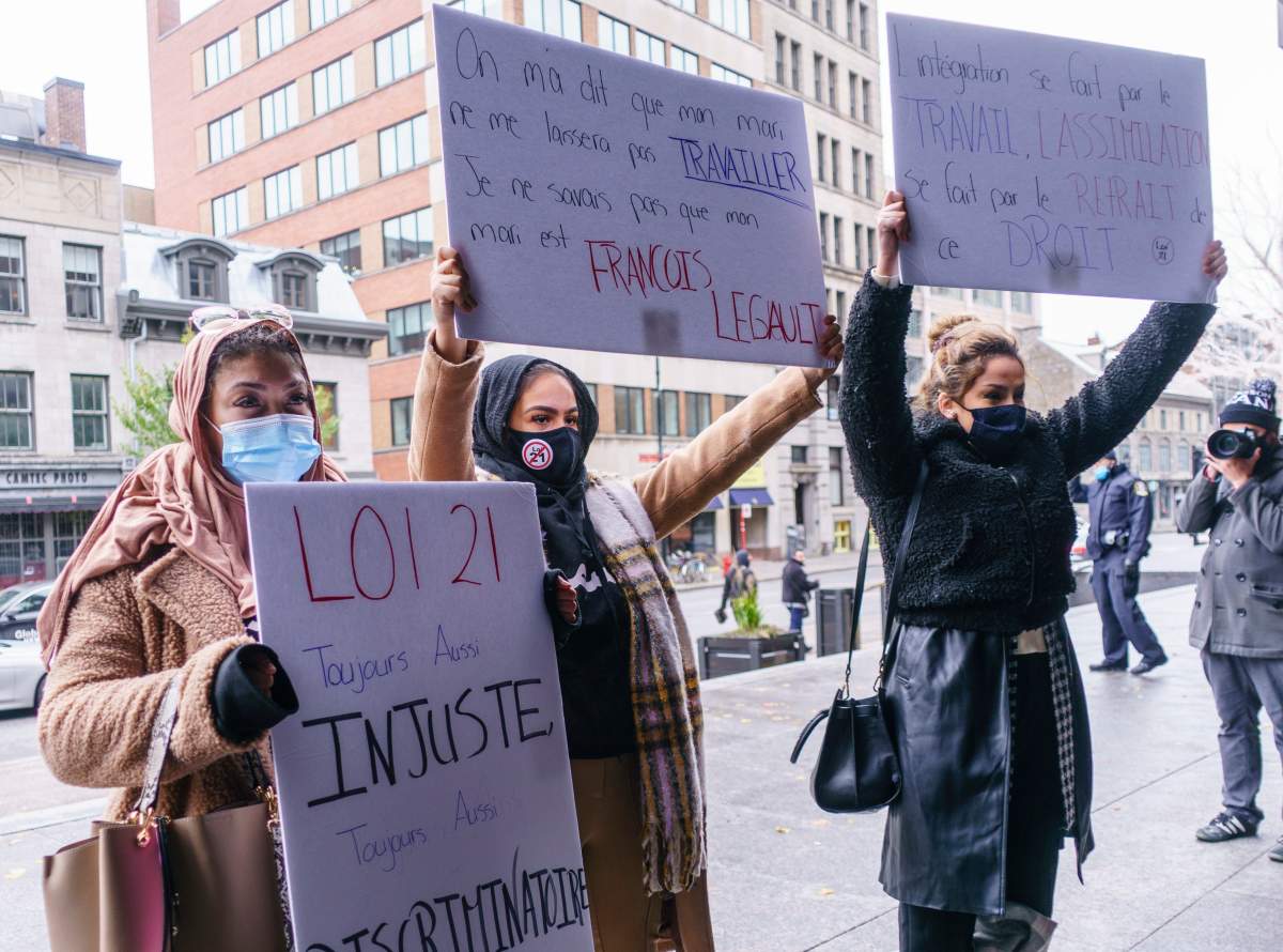 Demonstrators stand outside the courthouse on the first day of the constitutional challenge to Bill 21 before the Quebec Superior Court in Montreal on Nov. 2. Closing arguments have now begaun. Monday, Nov. 30, 2020.
