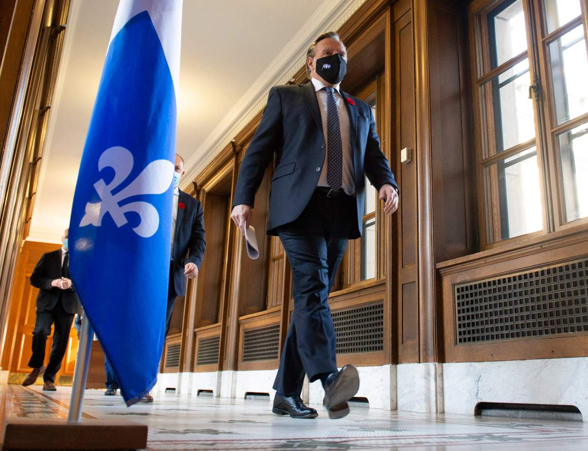 Quebec Premier Francois Legault walks to a news conference on the COVID-19 pandemic, Thursday, November 5, 2020 at the legislature in Quebec City. 