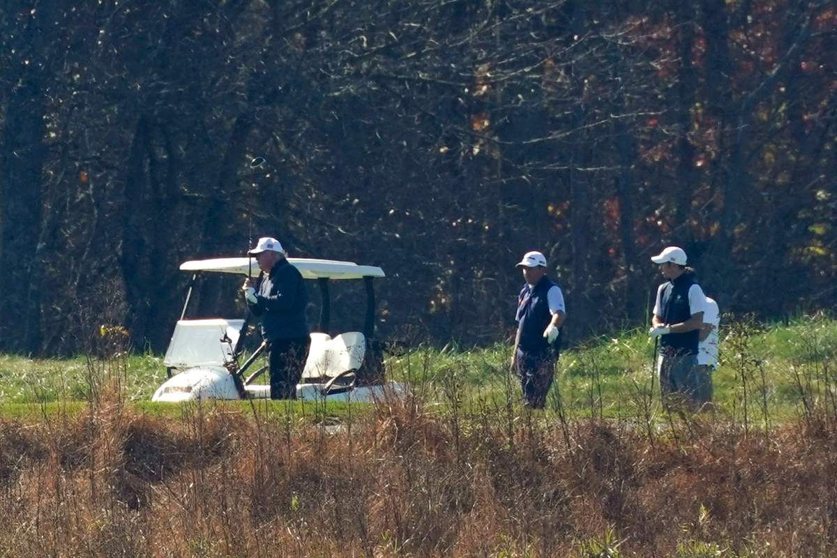 President Donald Trump participates in a round of golf at the Trump National Golf Course on Saturday, Nov. 7, 2020, in Sterling, Va.