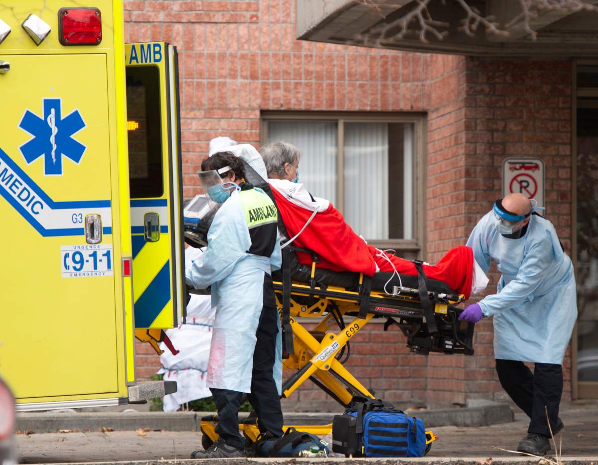 First responders transport a resident from a long term care facility Friday, November 20, 2020  in Montreal.