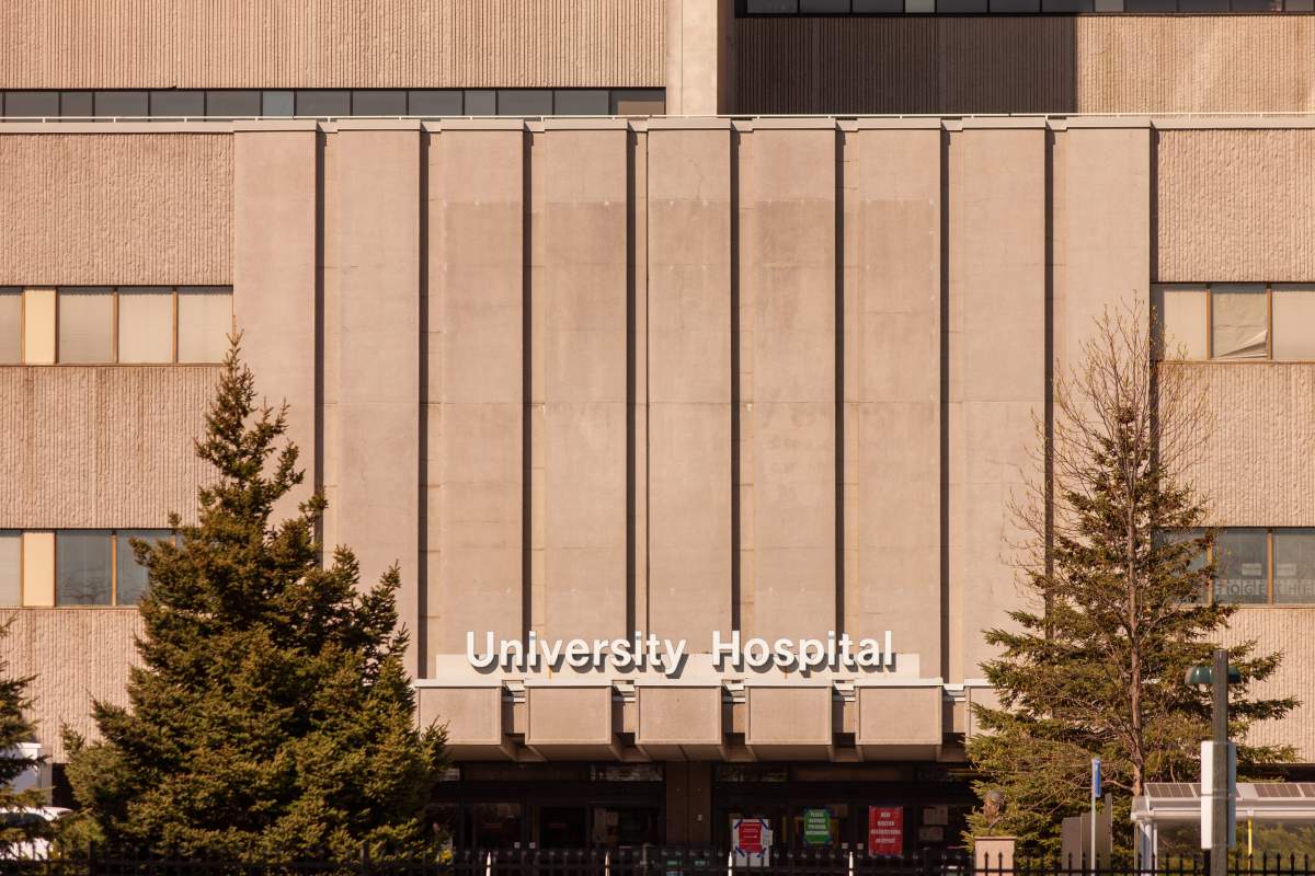 A close up of a hospital building.