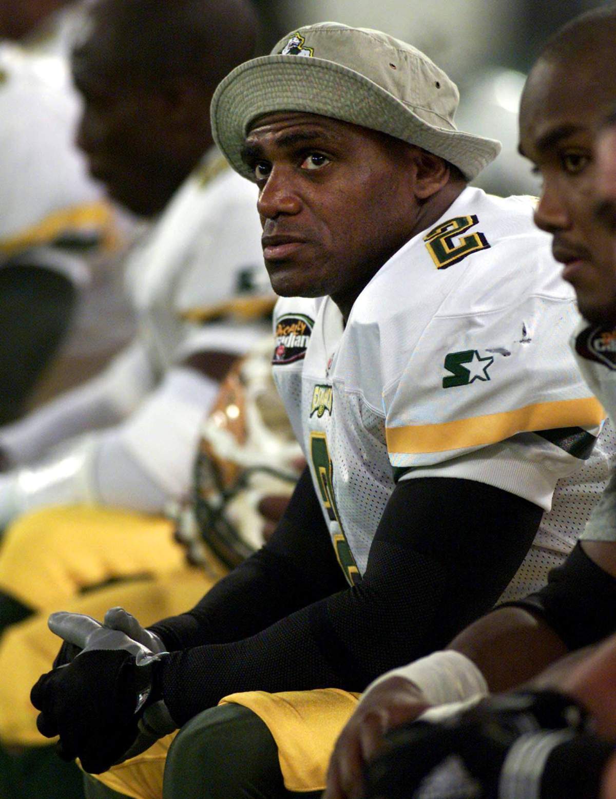 Edmonton Eskimos' Henry (Gizmo) Williams sits on the bench during the final minutes of the fourth quarter of CFL action against the Toronto Argonauts in Toronto Saturday Nov.  6, 1999.  (CP PHOTO/Kevin Frayer).