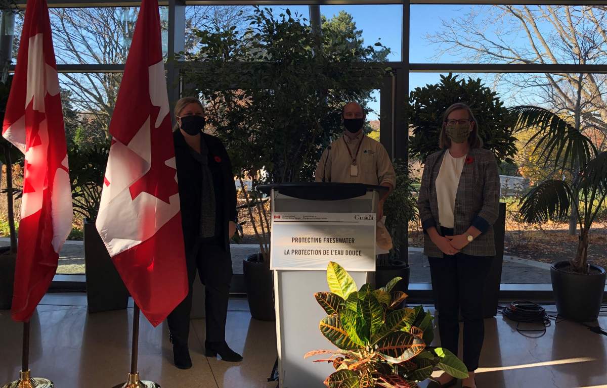 The RBG's Darlene Bennett-Howes and Tys Theijsmeijer pose with Burlington MP Karina Gould following Tuesday's funding announcement at the Rock Garden.