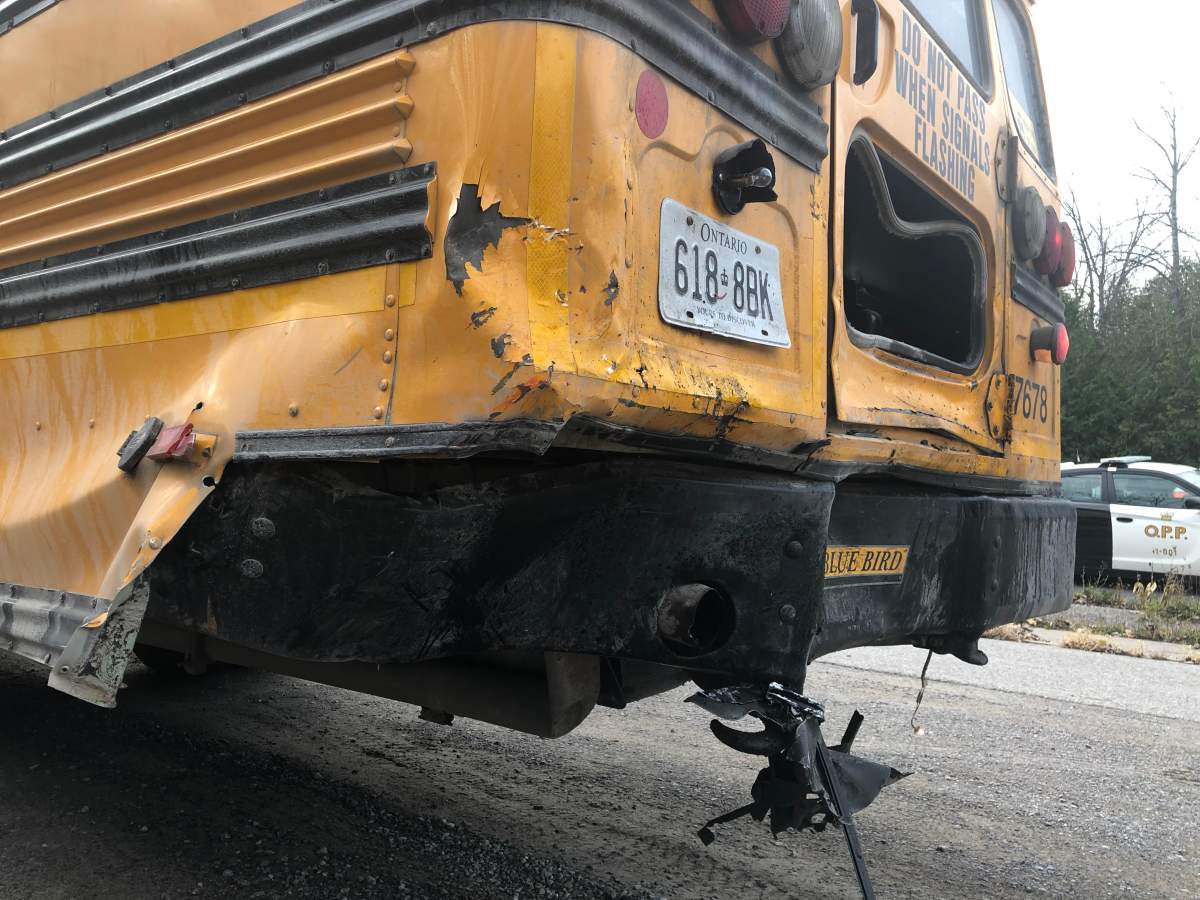 A pickup truck rear-ended a school bus near Brighton on Tuesday morning.