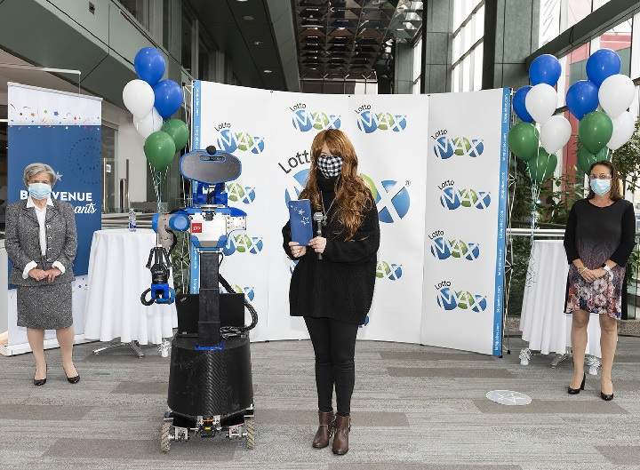 Shu PIng Li claims her $70 million jackpot at Loto-Québec offices in Montreal on Friday, Nov. 6, 2020.