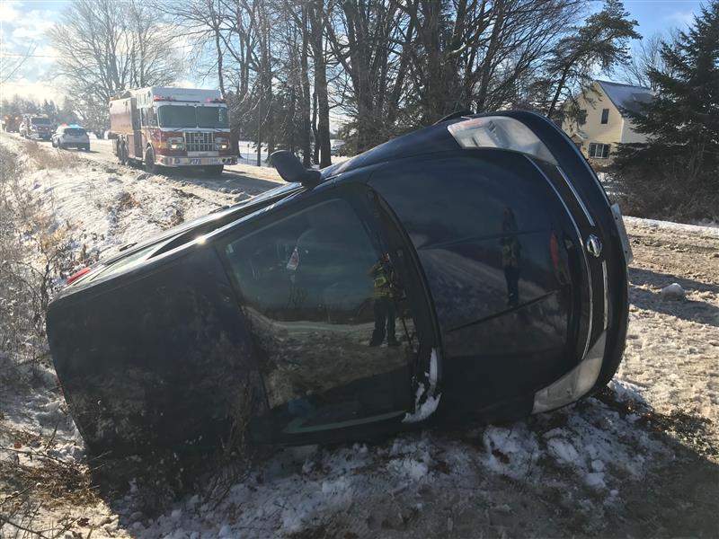 Fire crews attend the scene of an overturned vehicle on McVagh Road in Vars on Nov. 23, 2020 following a blast of snow overnight in Eastern Ontario.