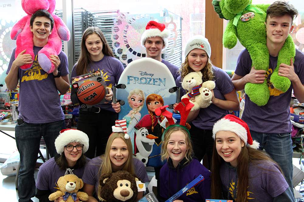 Penticton high school students surrounded by donations from the 2019 Toys for Tots and Teens drive in 2019. For 2020, organizers say new health restrictions forced them to combine 10,000 Tonight and the Toys for Tots and Teens campaigns under one umbrella: Penticton Provides.