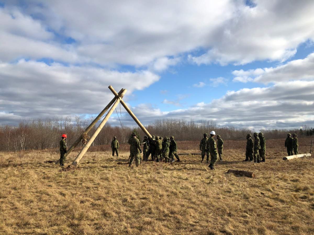 Assault pioneers in the Princess Louise Fusiliers reserve unit erect a gin and shear in a decommissioned air field in Shearwater, N.S. on Nov. 22, 2020.