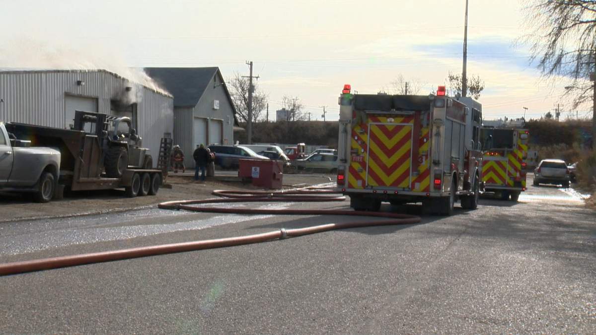 Thick black smoke and flames could be seen coming from the industrial garage in Saskatoon on Sunday.