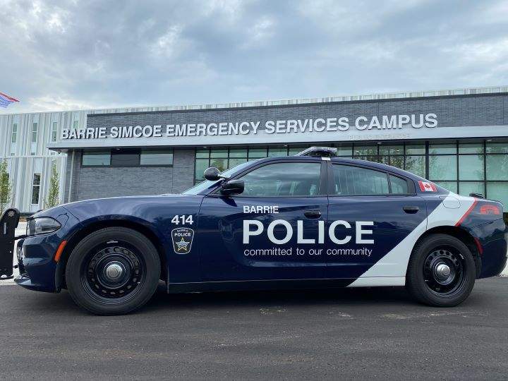 Police arrested and charged two men after they executed two unrelated search warrants at addresses in Orillia, Ont.