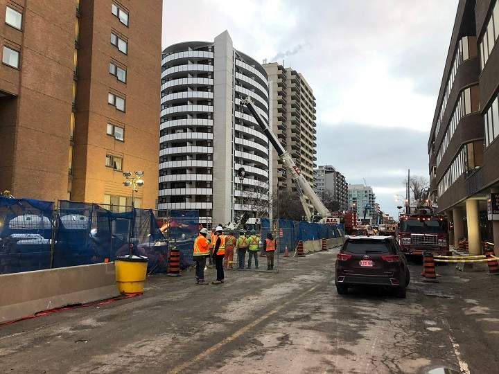 A crane tipped over near the future Mount Pleasant Eglinton-Crosstown station.