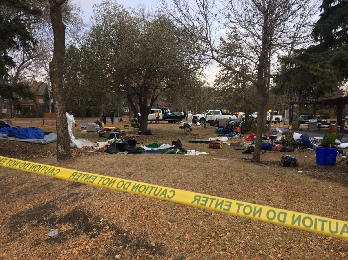 A homeless encampment in Old Strathcona is torn down Thursday, Nov. 5, 2020.