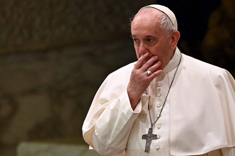 Pope Francis arrives to lead his weekly general audience in the Paul VI hall at the Vatican on October 21, 2020.