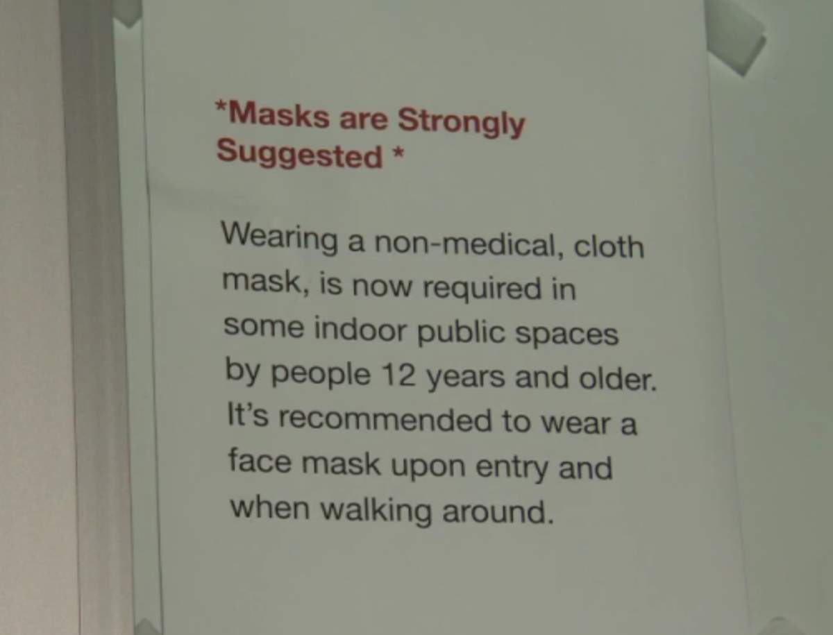A sign posted outside Riverside Calvary Chapel outlines its mask wearing policy for worshippers.