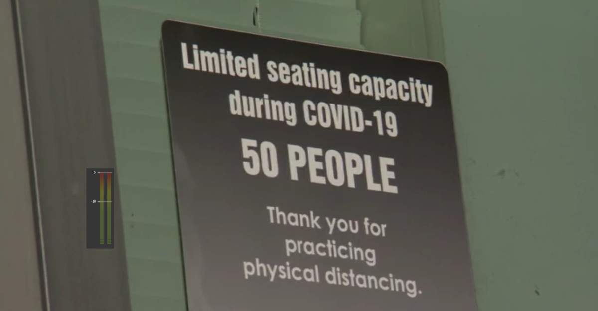A sign posted outside Riverside Calvary Chapel in Langley pegs the maximum number of worshippers allowed inside at 50 people, despite restrictions in place banning group services at religious centres.