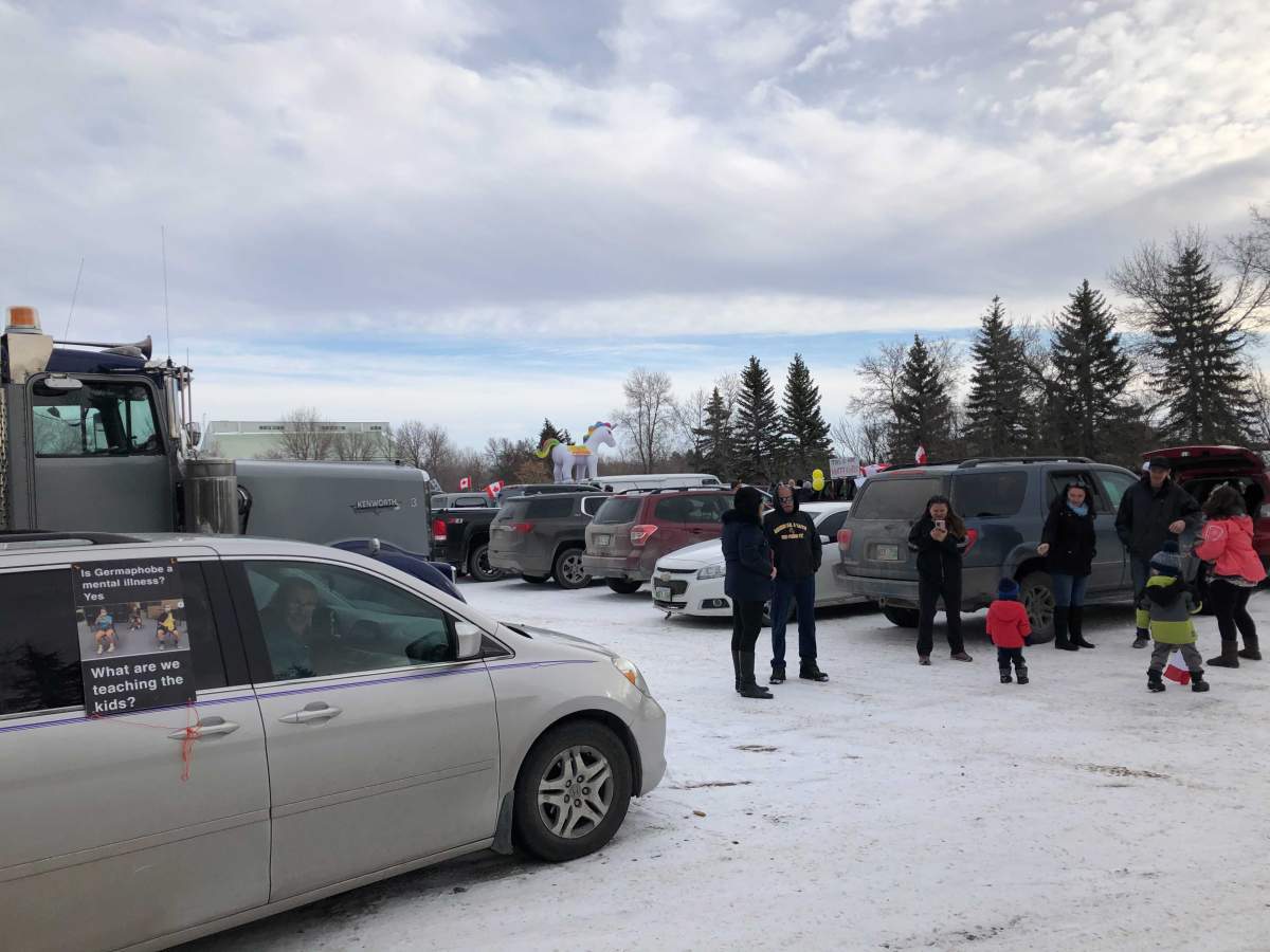 The Hugs over Masks rally in Steinbach Saturday.