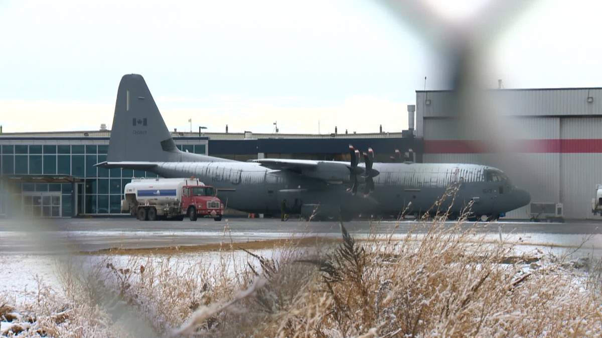 Military plane seen at the Calgary International Airport on Wednesday, Dec. 9, 2020.