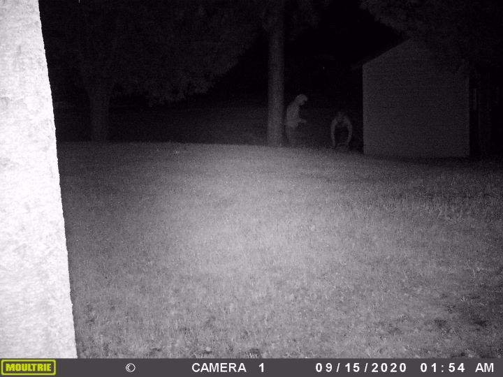 Police obtained photos from a nearby trail camera that shows two suspects in the area with what investigators say appears to be a gas can.