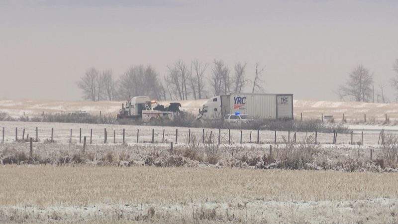 RCMP investigate a serious collision between a semi-trailer and a car on Highway 22x between Highway 797 and Highway 24 on Wednesday, Dec. 9, 2020.
