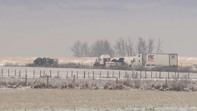 RCMP investigate a serious collision between a semi-trailer and a car on Highway 22x between Highway 797 and Highway 24 on Wednesday, Dec. 9, 2020.