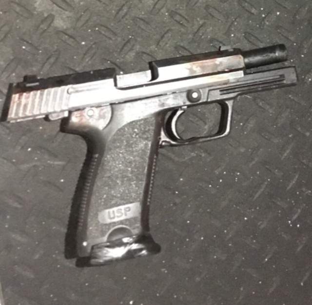 A handgun recovered from the scene of a police shooting in Grande Prairie, Alta. on Tuesday, Dec. 8, 2020. 