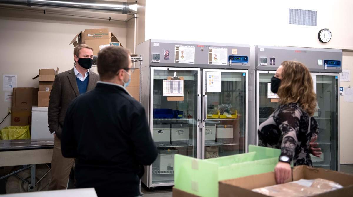 Kari Bergstrom, immunization business manager with Alberta Health, provides logistical highlights of the provincial COVID-19 cold storage vaccine depot to Health Minister Tyler Shandro on Monday, December 14, 2020.