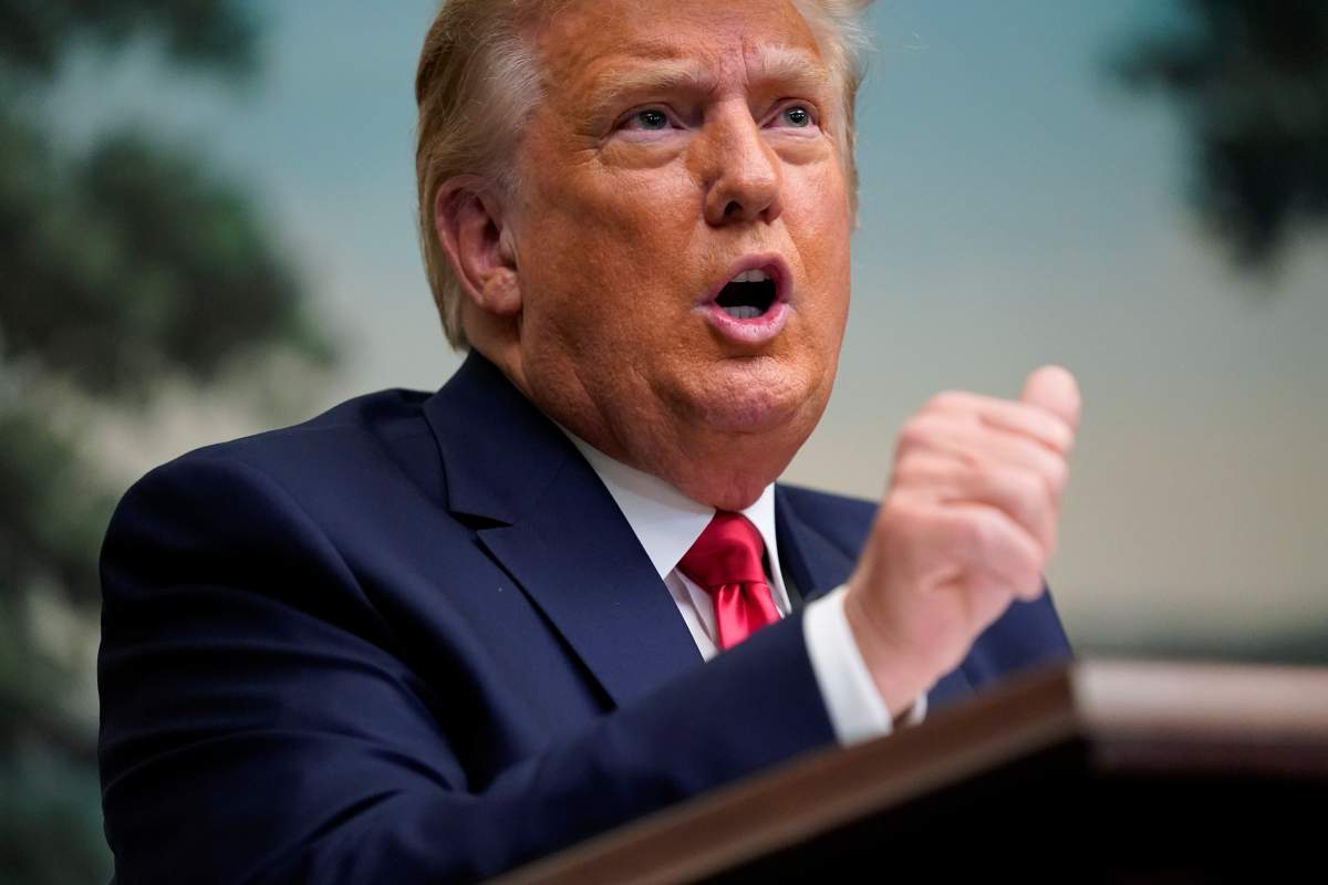 U.S. President Donald Trump speaks with reporters after participating in a video teleconference call with members of the military on Thanksgiving, Thursday, Nov. 26, 2020, at the White House in Washington.