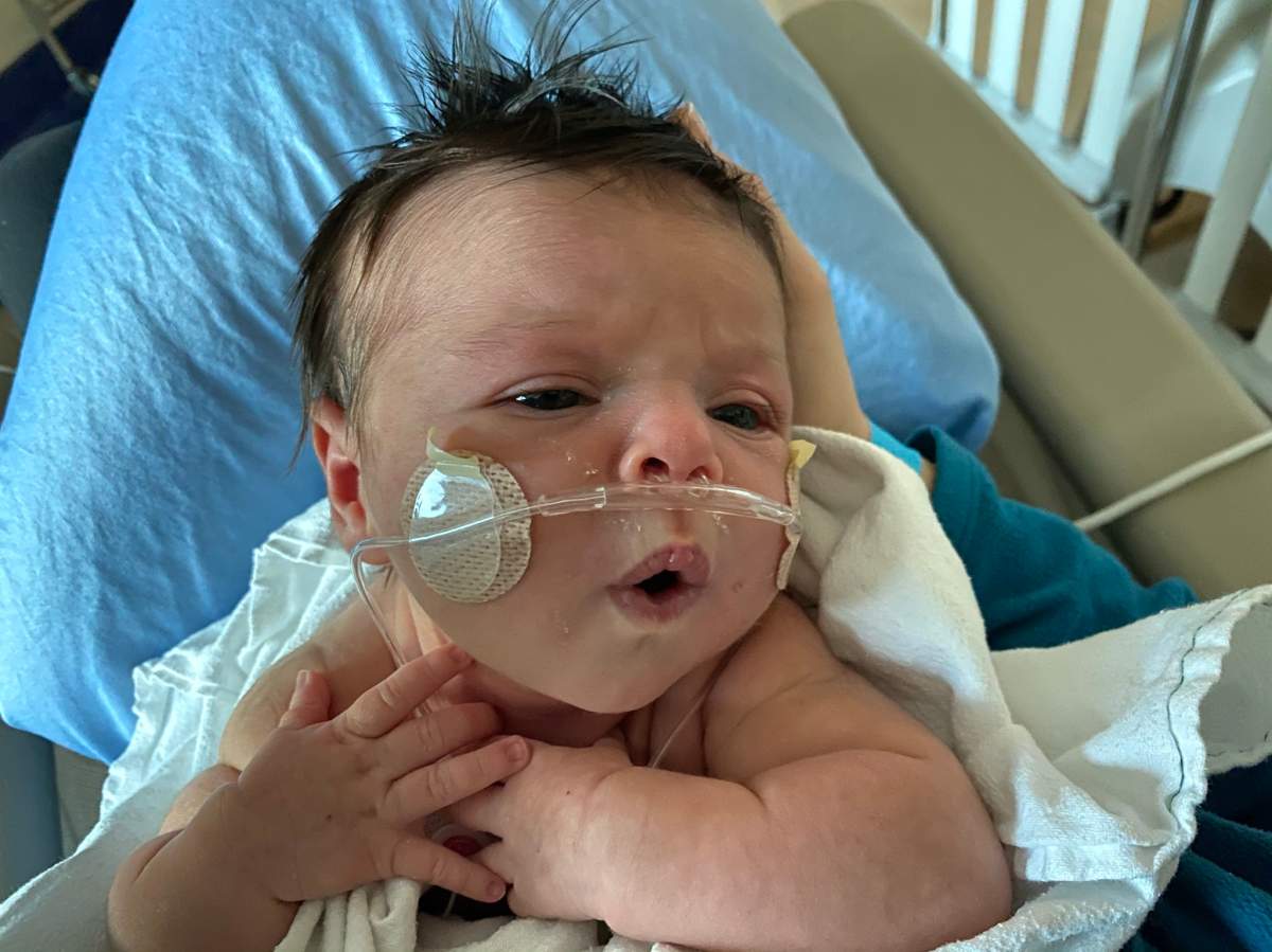 When five-day old Nora Forrest, shown in Calgary in a family handout photo, was first hospitalized with COVID-19, her parents didn’t know if she’d survive. Nora was born on Nov. 22, full term and healthy. The following night, her mom started feeling ill. The bug then hit the baby’s dad, grandmother and big sister.