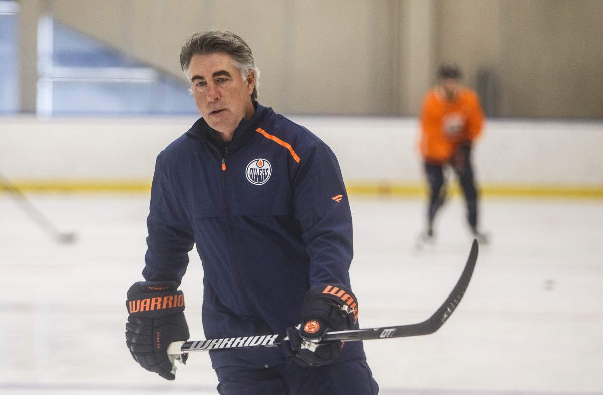 Edmonton Oilers' head coach Dave Tippett skates during training camp in Edmonton, Alta., on Tuesday July 14, 2020. THE CANADIAN PRESS/Jason Franson.