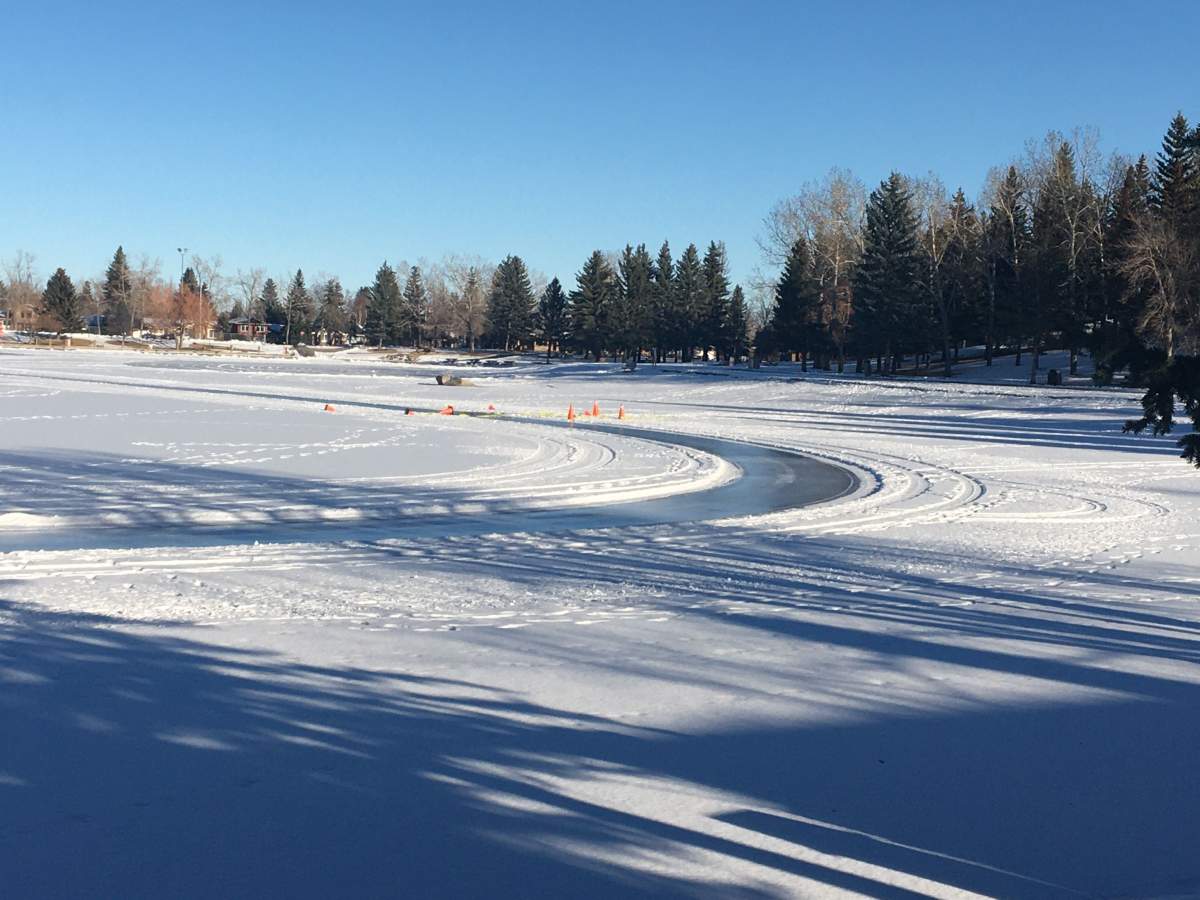 A Calgary worker fell through ice at a community lake while operating a tractor, Saturday, Dec. 19, 2020.
