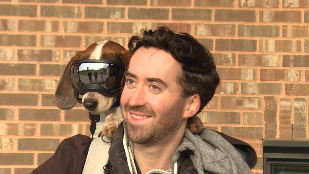 Garry and Willy gearing up for a cruise on their bike. Willy is snuggled into his backpack for the adventure.