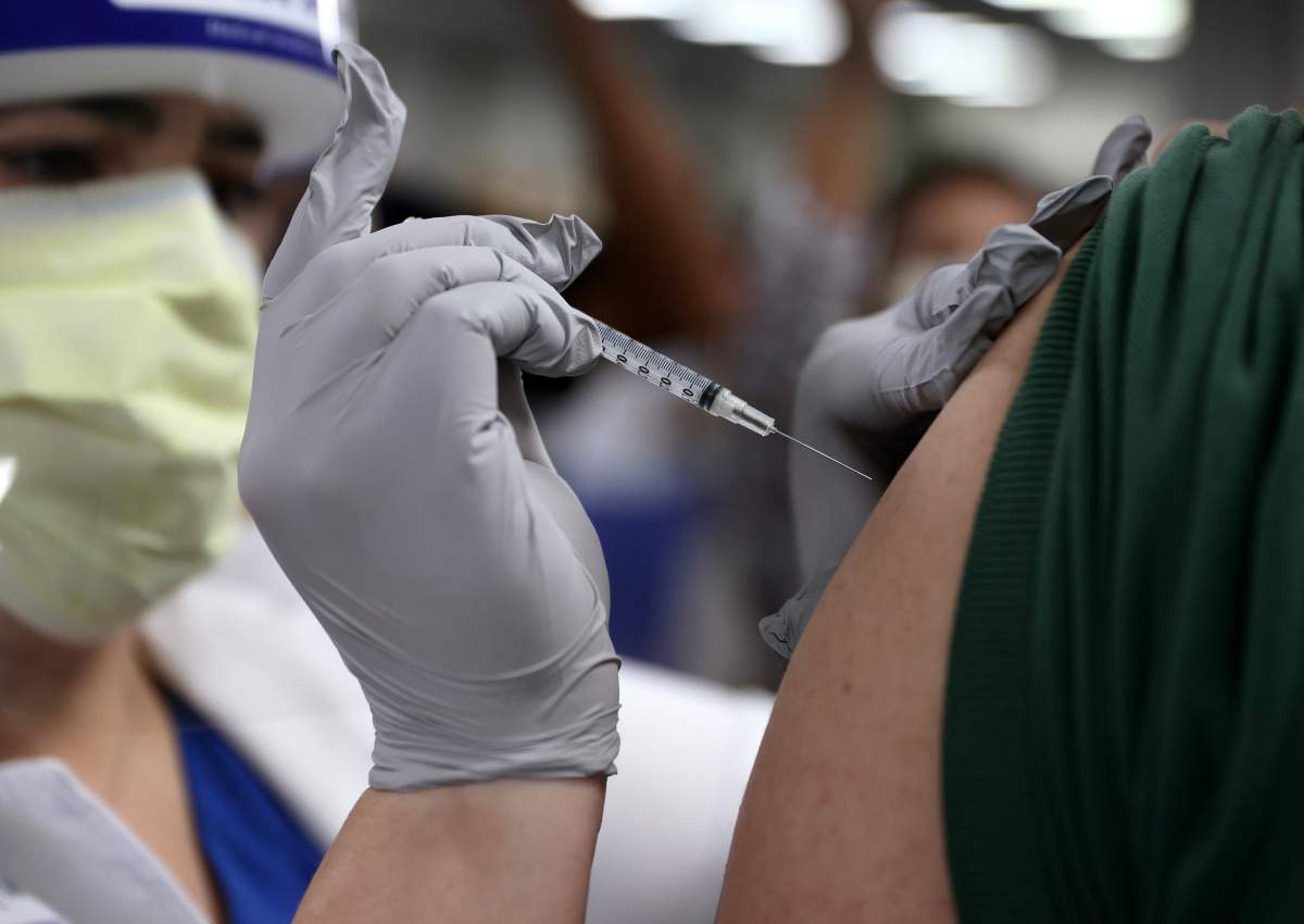 The initial COVID-19 vaccine pilot project is now complete in Regina and nearing 90 per cent completion in Saskatoon.