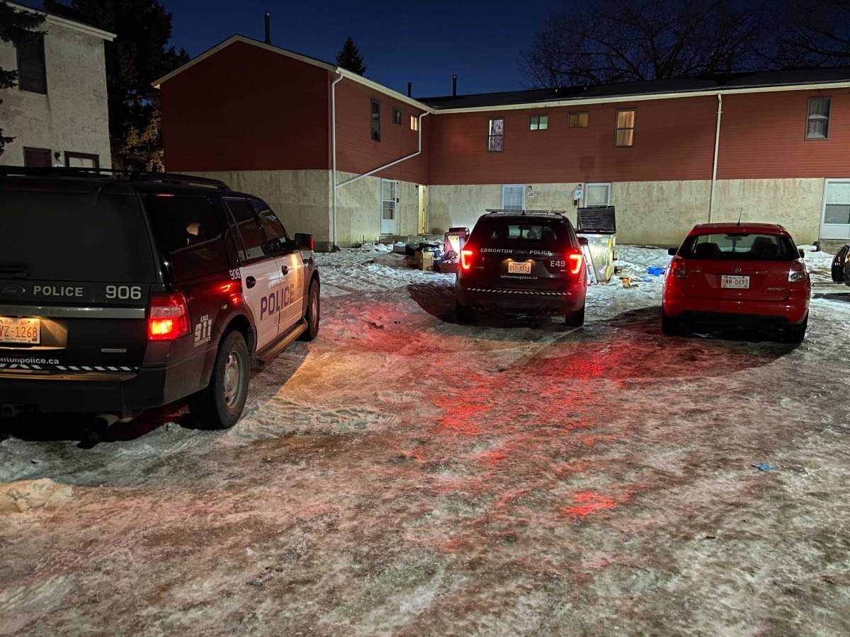 Edmonton police investigating a homicide at a townhome at 58 Street and 34 Avenue on December 9, 2020.