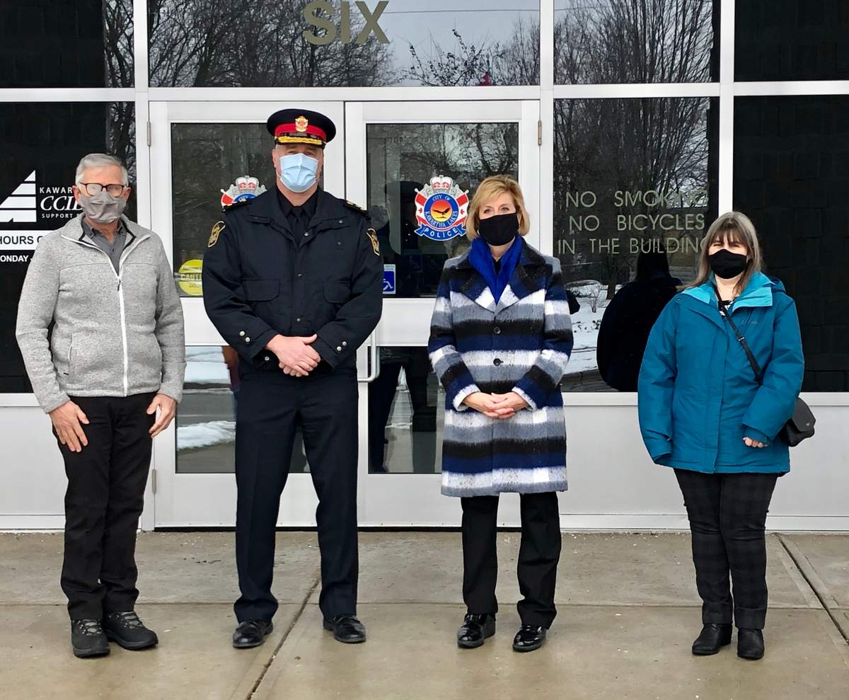 From left, Don Thomas, chair of the City of Kawartha Lakes Police Services Board, police chief Mark Mitchell, MPP Laurie Scott and Hope Lee, CEO of the KLH Housing Corp., pose for a photo after an announcement of funding for CCTV cameras.